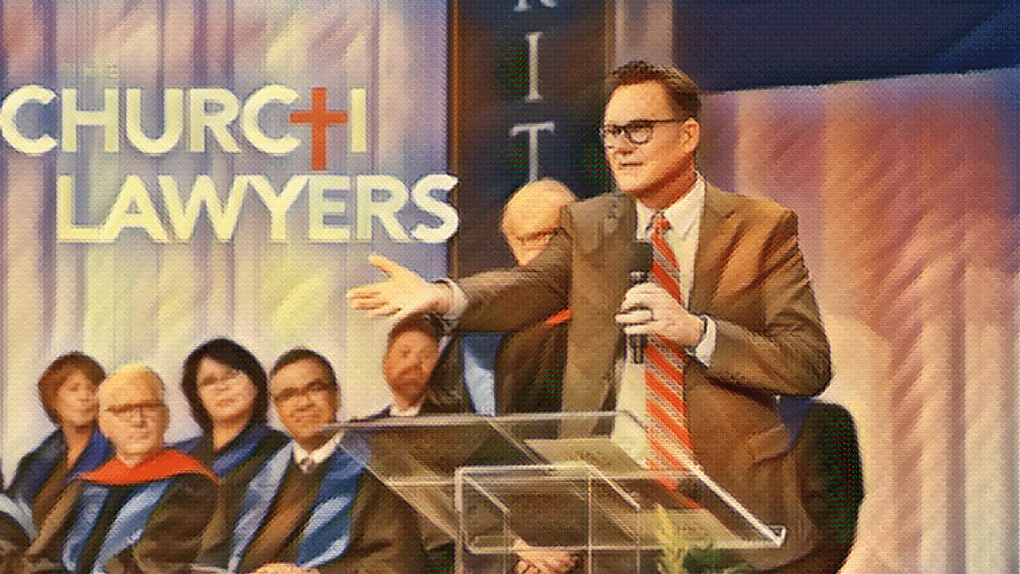 Pastor speaking at a podium with choir members behind him; ‘Church Lawyers’ text displayed in background with red cross.